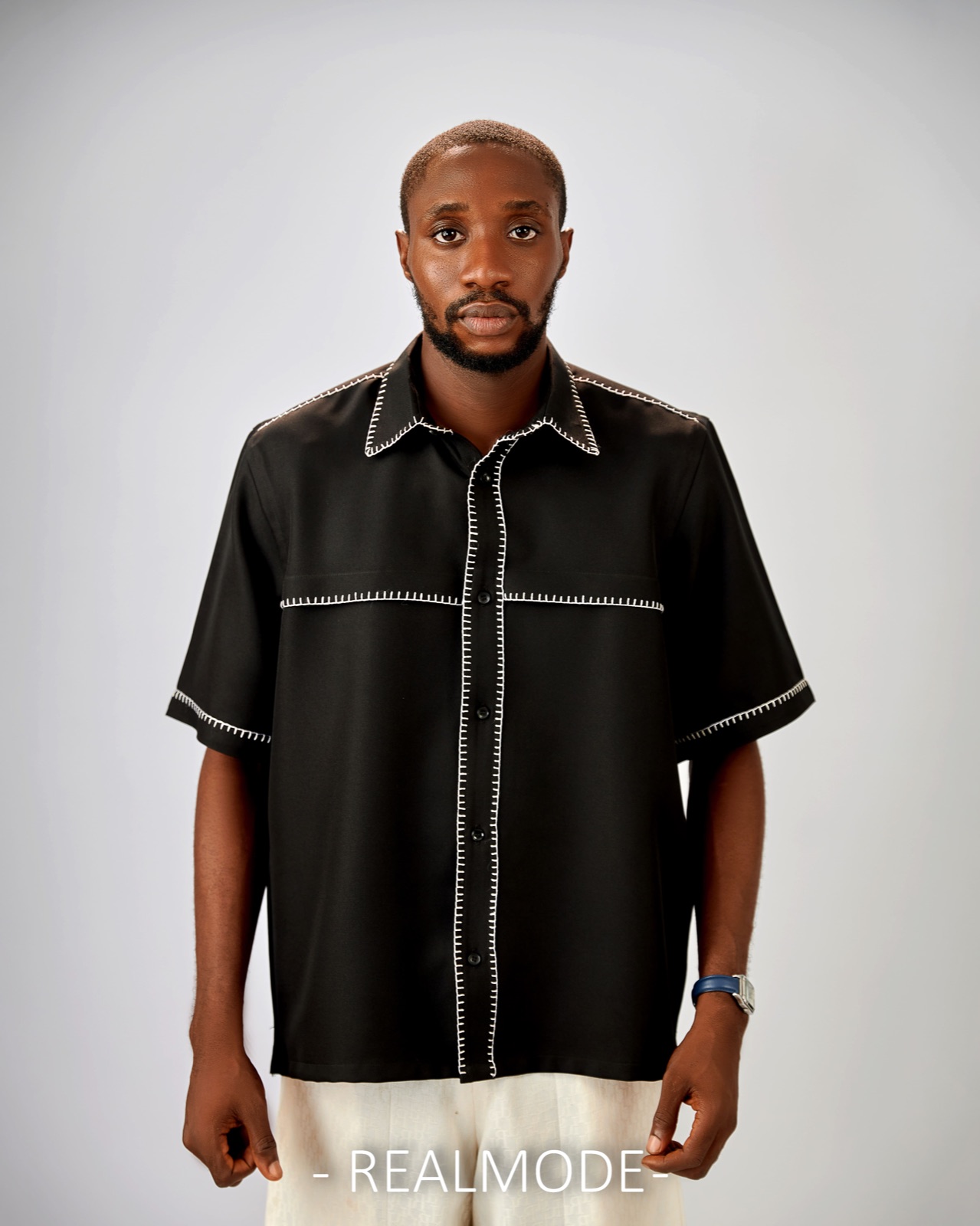 Black camp shirt with white contrast stitching